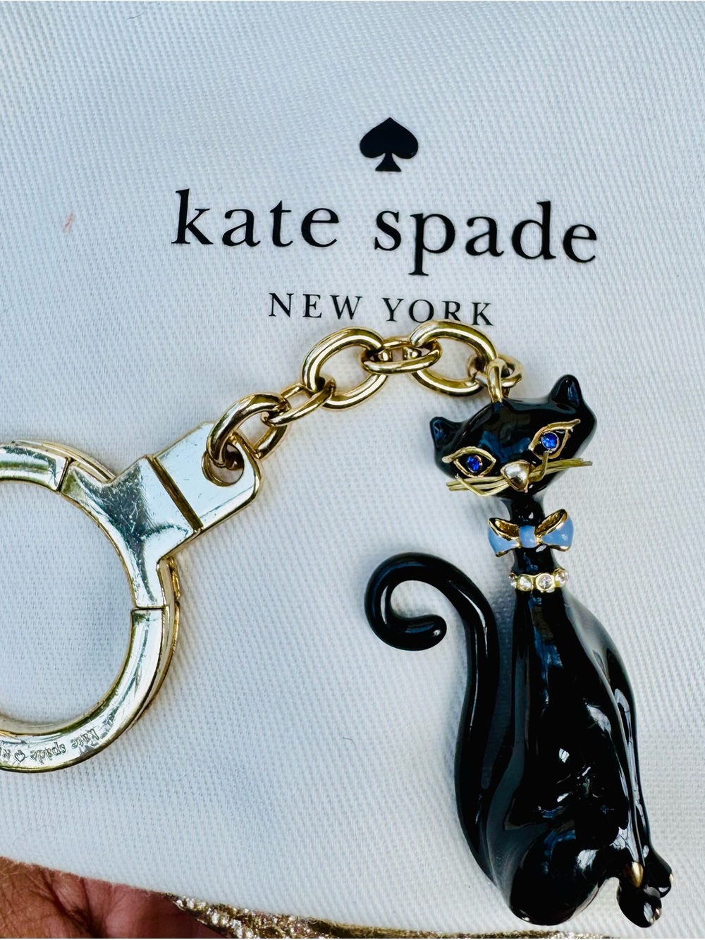 kate spade black enamel cat bag charm with gold accents